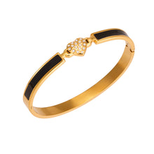 Black enamel heart zircon bangle in 316L stainless steel with 18K gold finish for wholesale boutique jewelry buyers