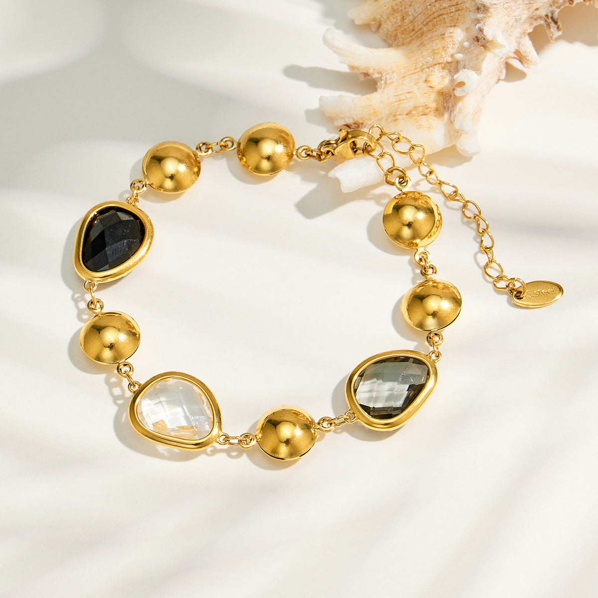 Black glass stone bracelet flat lay