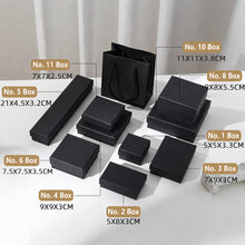 Black jewelry packaging boxes in multiple sizes for rings earrings bracelets necklaces and watches