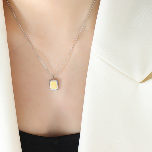 Close-up view of 18K PVD gold finish on stainless steel necklace