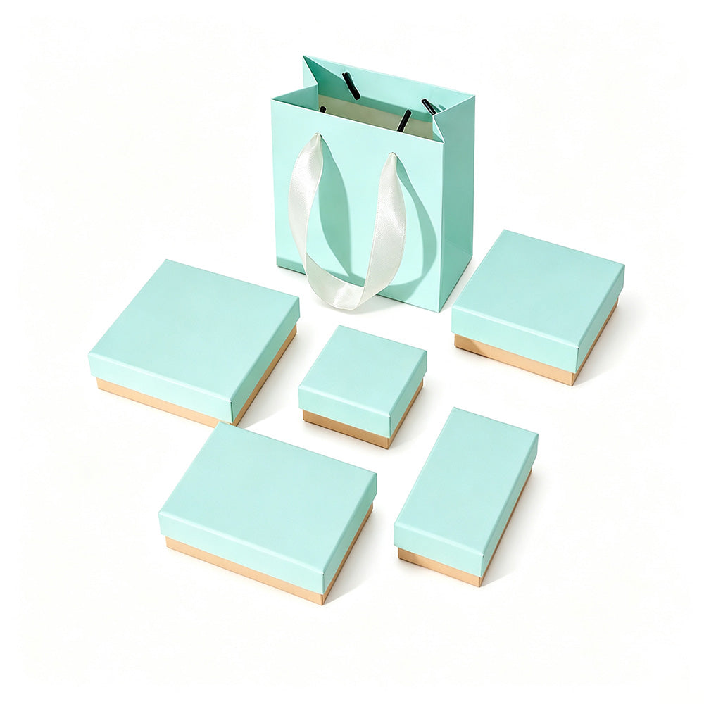 Blue and pink jewelry boxes with foam inserts and matching gift bag for wholesale jewelry packaging