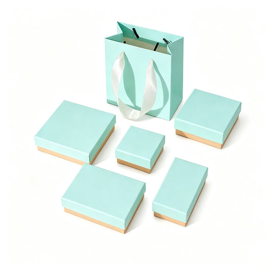 Blue and pink jewelry boxes with foam inserts and matching gift bag for wholesale jewelry packaging