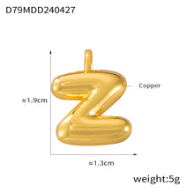 Close-up of the 316L stainless steel bubble letter pendant