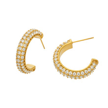 C-shaped pavé cubic zirconia hoop earrings made from 316 stainless steel in gold and steel finishes