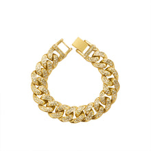 Chunky gold-tone Cuban link bracelet with clear cubic zirconia on bold interlocking links