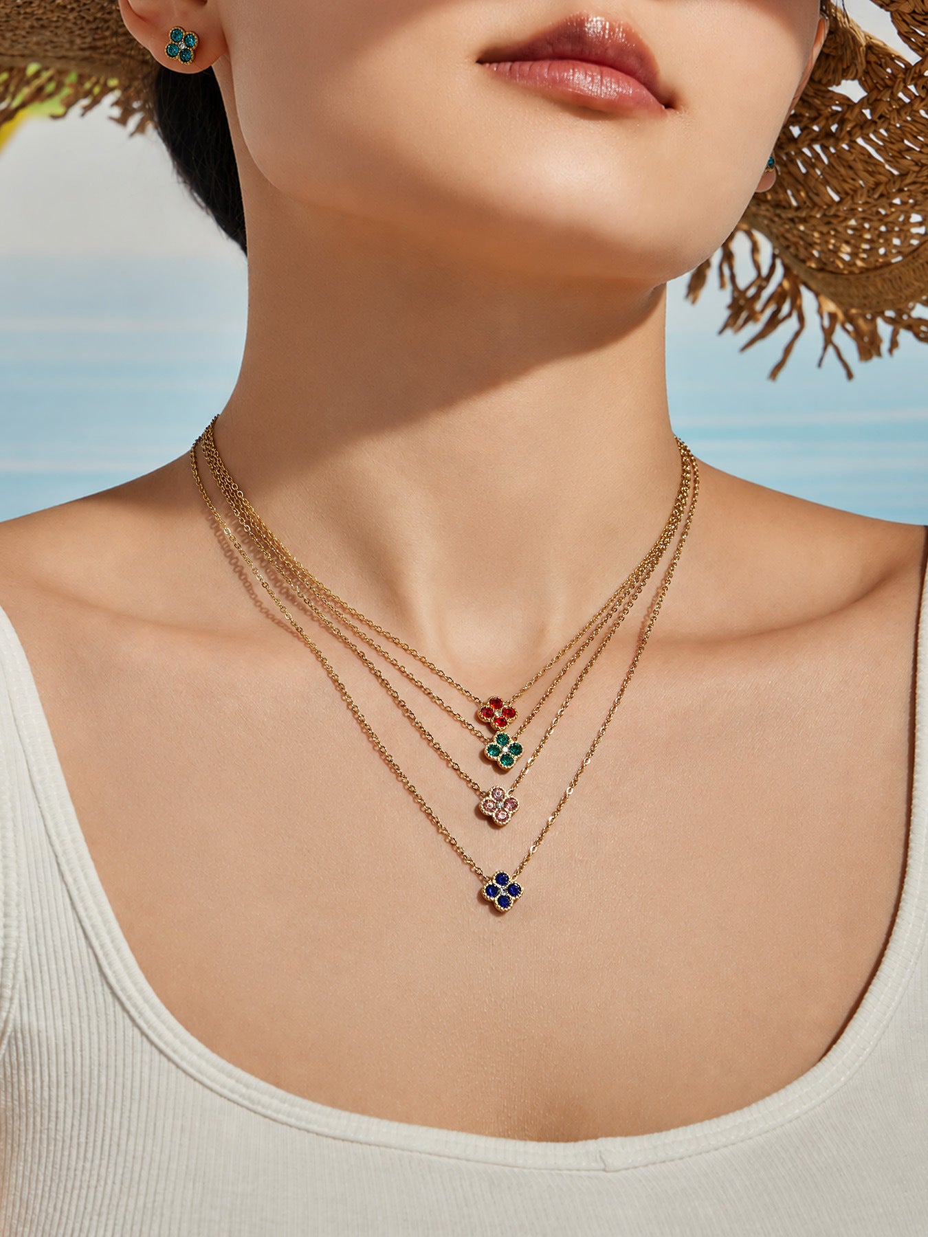 Model wearing colorful clover zircon pendant necklace for gift jewelry and boutique displays