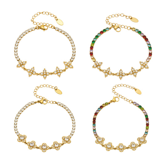 Steel-tone zircon clover bracelets displayed together on a light background