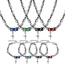 Stainless steel color zircon cross bracelet and necklace collection with black, red, blue and green stone options for wholesale jewelry buyers