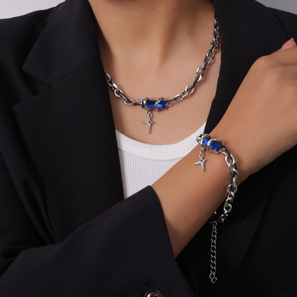 Model wearing layered stainless steel cross necklaces with color zircon accents for street-style and trend jewelry displays