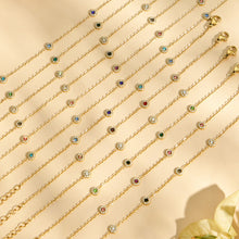 Colorful cubic zirconia station chains displayed in multiple stone colors