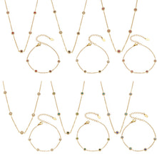 Colorful bezel-set cubic zirconia station necklaces and bracelets in gold-tone finish