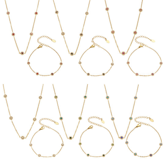 Colorful bezel-set cubic zirconia station necklaces and bracelets in gold-tone finish
