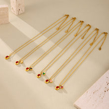 Colorful zircon ball chain necklaces arranged in a parallel flat lay