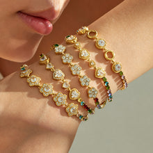 Colorful zircon chain bracelets stacked on wrist