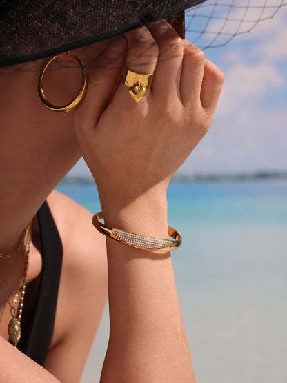 crescent zircon paved bangle model front view - gold crystal bangle styling with black outfit