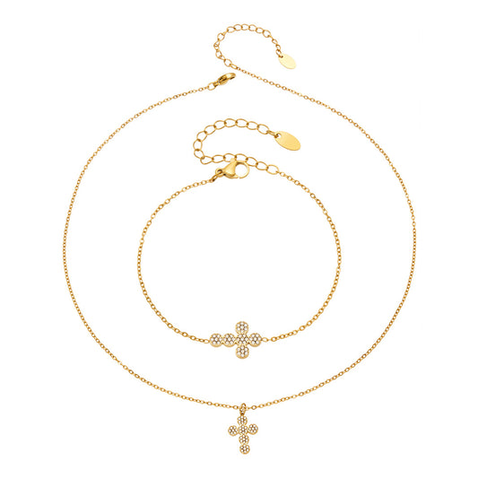 Gold cross zircon necklace and bracelet styles displayed together on a white background
