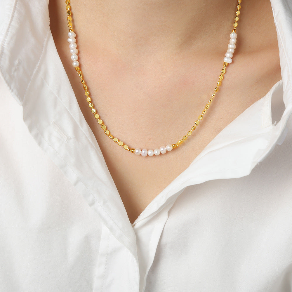 Gold plated pearl splice necklace styled in soft sunlight with freshwater pearl details for summer jewelry collections