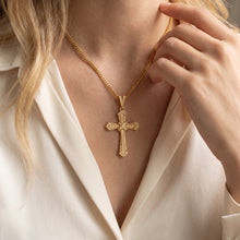 Delicate zircon cross pendant necklace worn on model