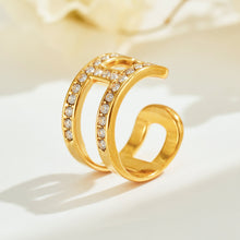 Double-band gold-tone stainless steel clip-on ear cuff with rhinestone accents