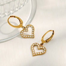 Double heart drop earrings with clear cubic zirconia and polished gold finish