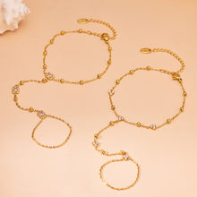 E550 and E551 gold zircon hand chain bracelets in floral and geometric designs