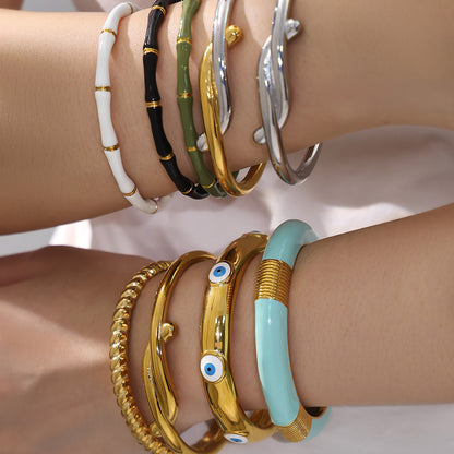 18k gold plated enamel stainless steel bangle set, model wearing on wrist