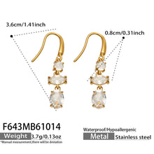 Dimension guide for gold-tone clear stone drop earrings showing the curved fishhook wires and three-stone design