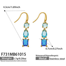 Measurement diagram for blue three-stone fishhook earrings showing their gold-tone hooks and graduated blue stones