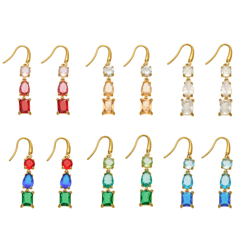 Gold-tone stainless steel three-stone drop earrings displayed in six color combinations with fishhook wires and mixed-cut stones
