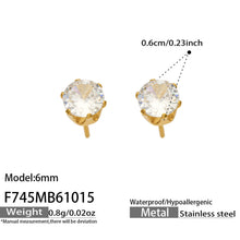 Size reference for 6mm gold-tone six-prong round stud earrings showing the larger clear stone and post design