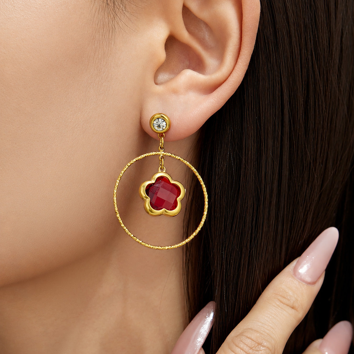 Close-up of 316L stainless steel earrings with colorful glass stones
