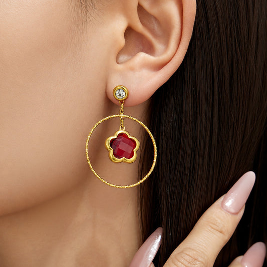 Close-up of 316L stainless steel earrings with colorful glass stones