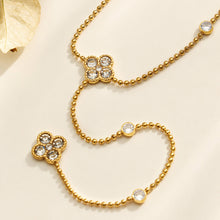 Elegant 316L Stainless Steel Four Leaf Clover Necklace on display