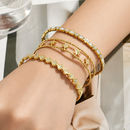 Chic gold color four-leaf flower bracelet with zircon