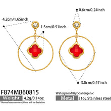 Red Czech glass four leaf flower earrings displayed elegantly