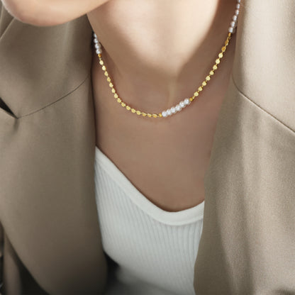 Model wearing freshwater pearl gold necklace with blazer for minimalist office jewelry and boutique gift displays-detail