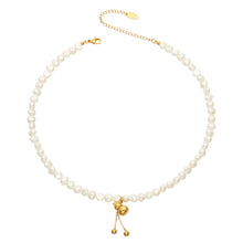 Freshwater pearl pendant necklace with gold gourd charm
