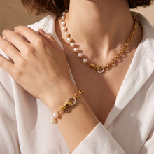 Freshwater pearl necklace and bracelet styled together with white zircon accents
