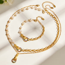 Freshwater pearl necklace and bracelet with gold chain and multicolor zircon details