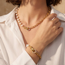 Matching freshwater pearl necklace and bracelet with gold chain and zircon accents