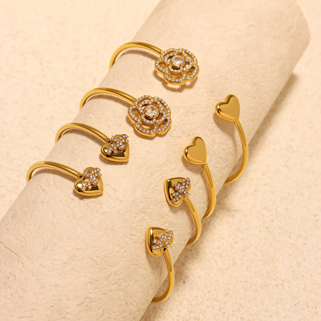 5A zircon full diamond heart rose thin open bangle set displayed on fabric, niche women's jewelry