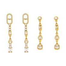 Geometric cubic zirconia long drop earrings in 316 stainless steel with gold and steel finishes