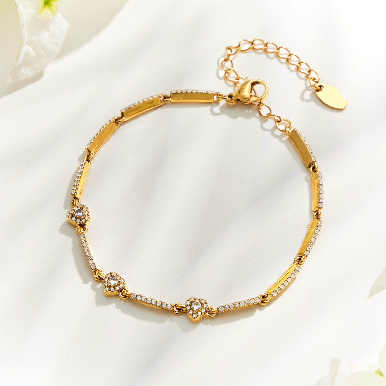 Gold square zircon bracelet with geometric stone details and adjustable extension chain