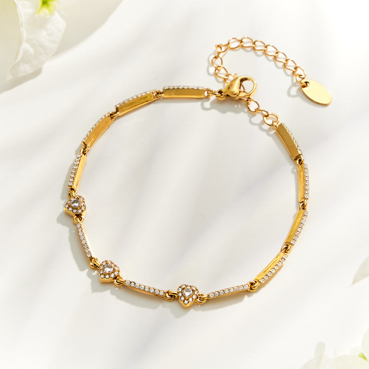 Gold square zircon bracelet with geometric stone details and adjustable extension chain