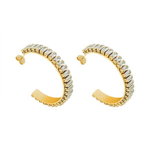 Gold C-shaped cubic zirconia hoop earrings made from 316L stainless steel