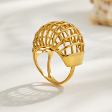 Gold tone cage-style 316L stainless steel statement ring shown in a clean product display