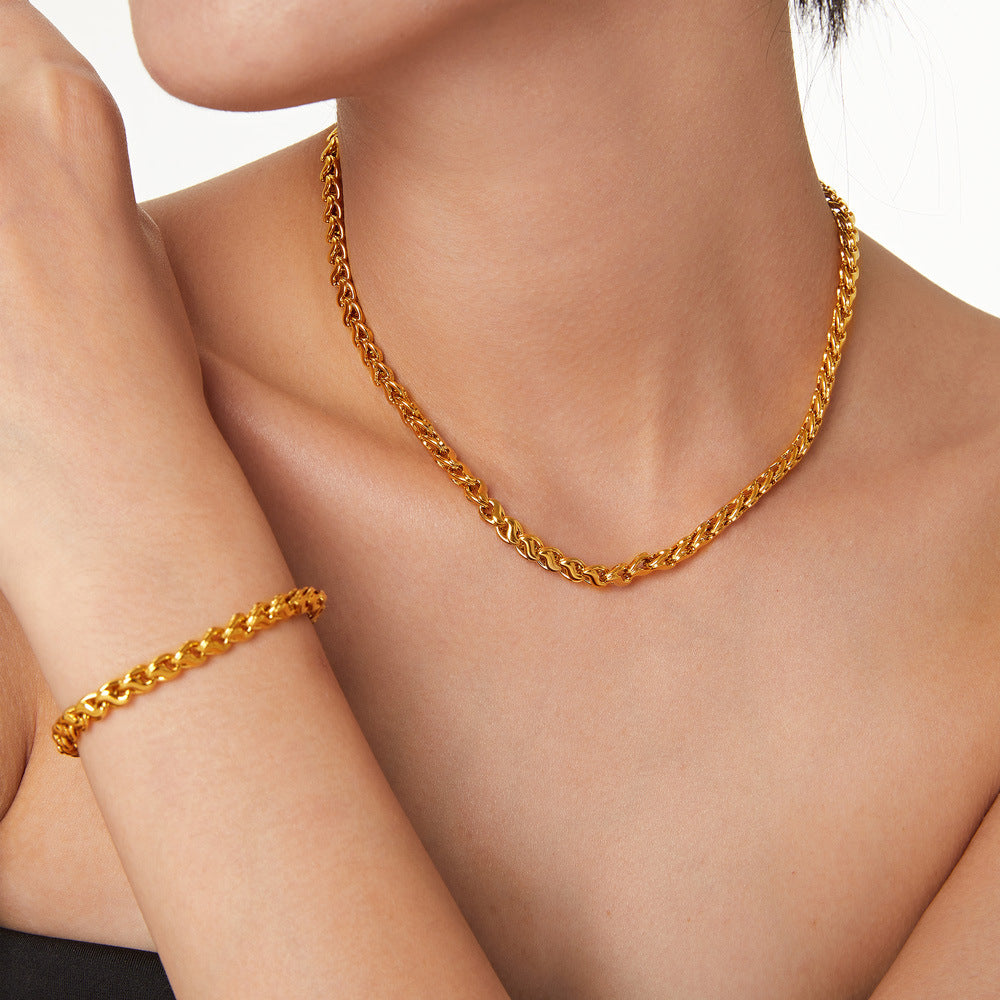Gold-tone copper necklace with interlocking geometric chain links