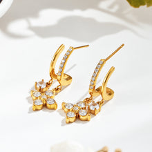 Gold-tone stainless steel flower CZ drop earrings displayed as a pair