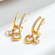 Gold-tone stainless steel heart charm drop earrings with cubic zirconia accents