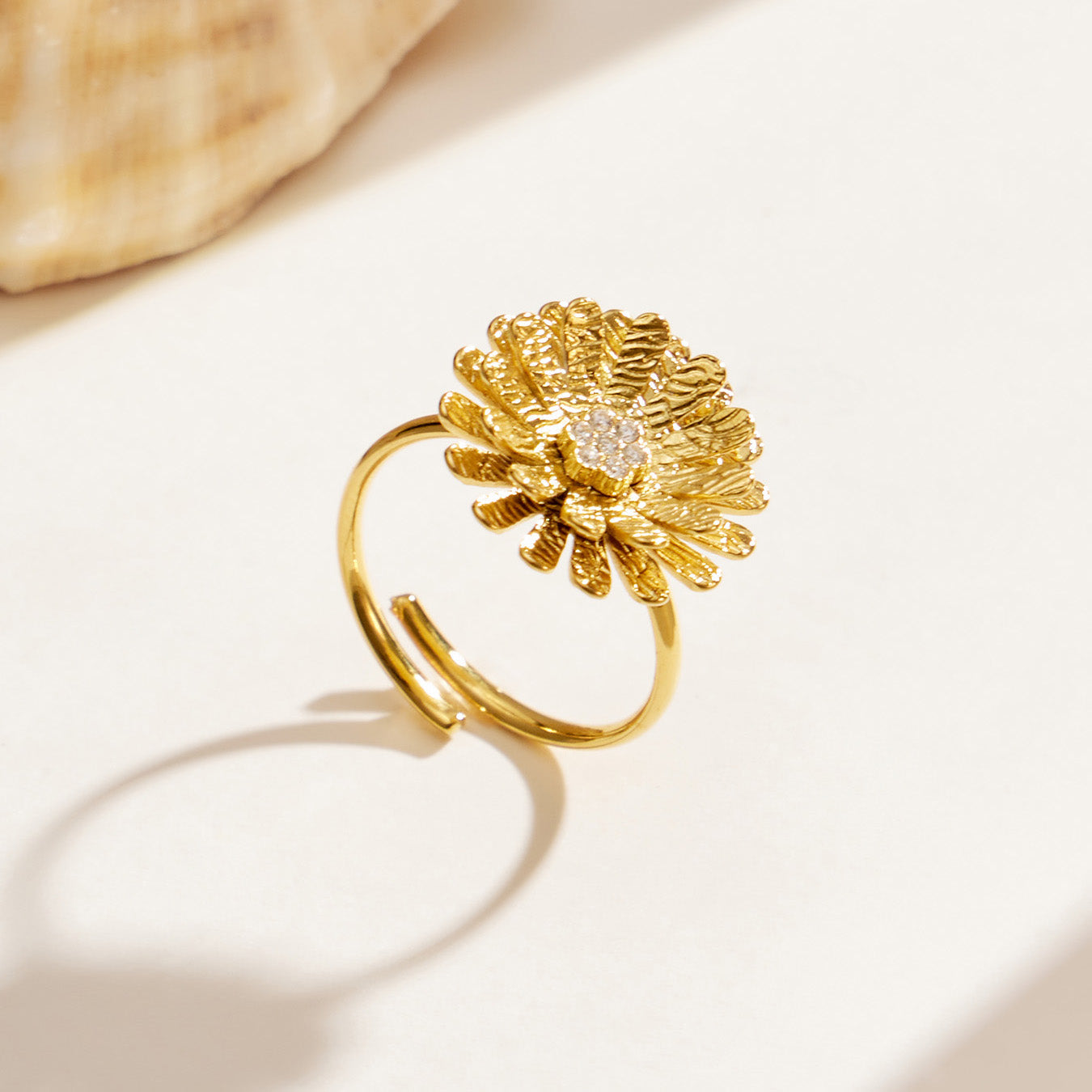 Gold daisy open ring in 316L stainless steel with detailed flower petals and 18K PVD finish